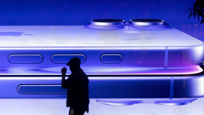 An advertisement for an Apple iPhone at an Apple Inc. store in central London,