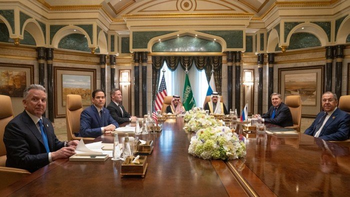 From left to right: US Middle East envoy Steve Witkoff, US secretary of state Marco Rubio, US national security adviser Mike Waltz, Saudi Arabia’s foreign minister Prince Faisal bin Farhan al-Saud, Saudi Arabia’s national security adviser Mosaad bin Mohammad al-Aiban, Russian president’s foreign policy adviser Yuri Ushakov, and Russia’s foreign minister Sergei Lavrov sit around a table in Diriyah Palace in Riyadh, Saudi Arabia on February 18 2025