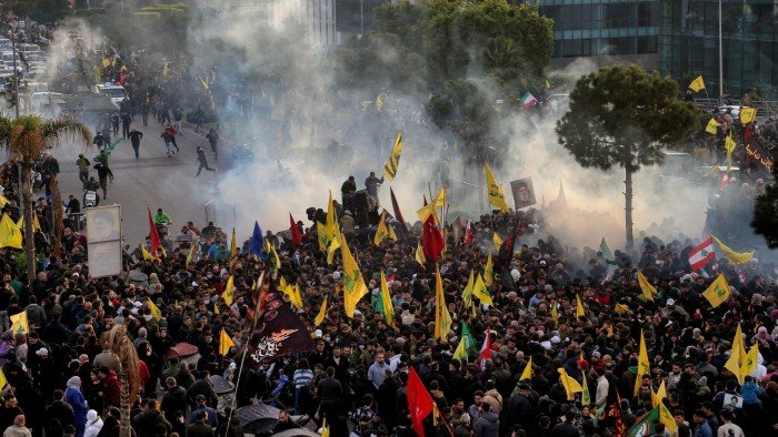 Hizbollah supporters clash with the Lebanese army after blocking the road to Beirut International airport on Saturday