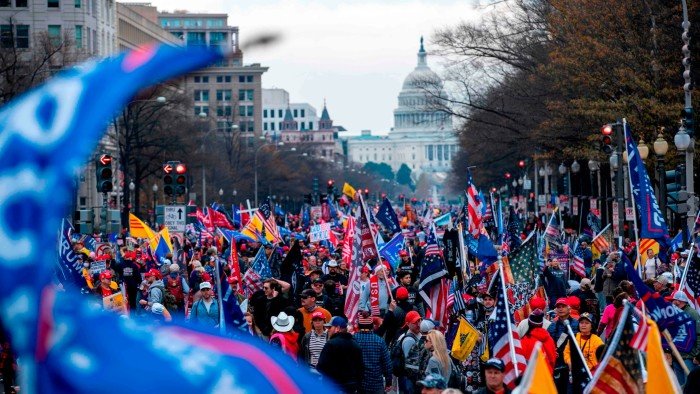 Supporters of US President Donald Trump participate in the Million MAGA March