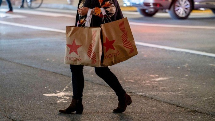 A shopper carries Macy’s bags in the Union Square area