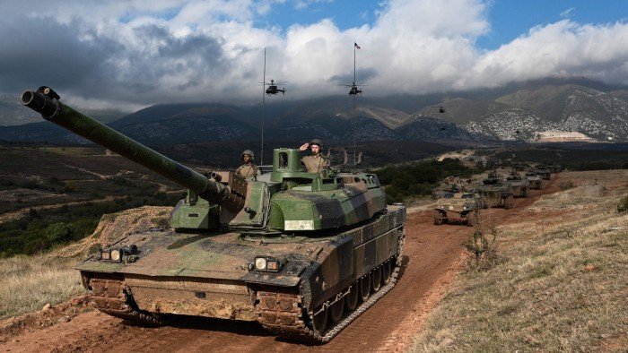 French Army officers drive their Leclerc tank during the exercise Olympic Cooperation  23 at the Petrochori training area, near Xanthi, northern Greece