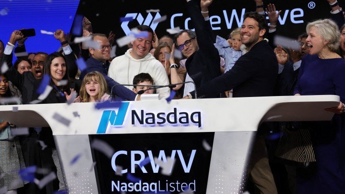 Michael Intrator, founder and chief executive of CoreWeave, gestures during the company’s IPO on the Nasdaq on Friday
