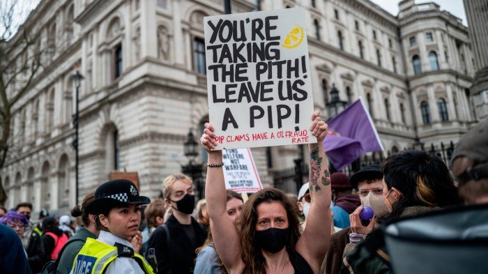 Protesters gather in Whitehall as Rachel Reeves leaves Downing Street to deliver her Spring Statement