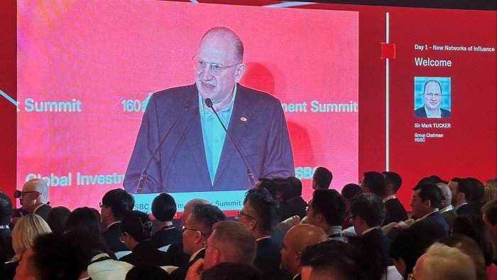 Mark Tucker speaks at a podium during the HSBC Global Investment Summit in Hong Kong