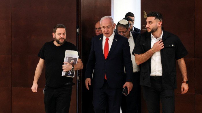 Israeli Prime Minister Benjamin Netanyahu followed by national security minister Itamar Ben-Gvir