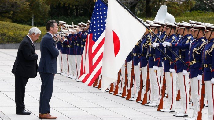 Gen Nakatani Japan’s defense minister, and Pete Hegseth, US secretary of defense, participate in an Honor Guard ceremony in Tokyo on Sunday