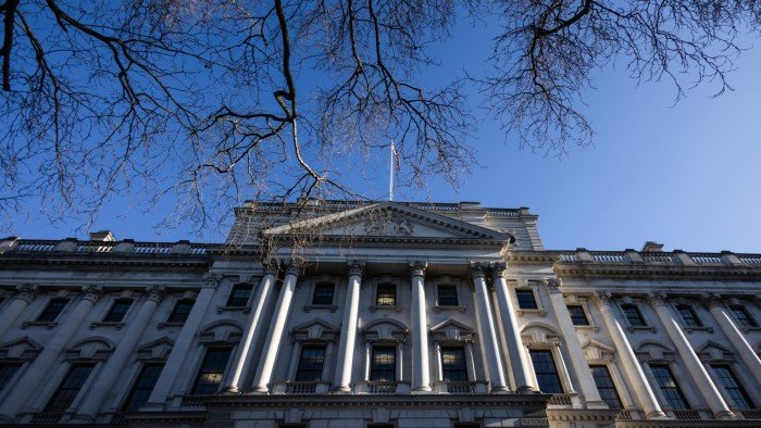 An imposing UK government building featuring classical pillars in the facade