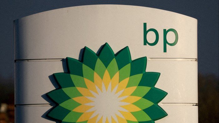 The image shows the BP logo on a sign outside a petrol station in Liverpool, Britain