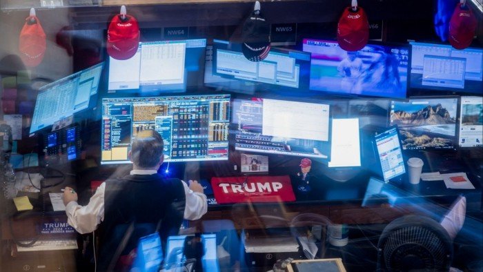 A trader works on the floor of the New York Stock Exchange