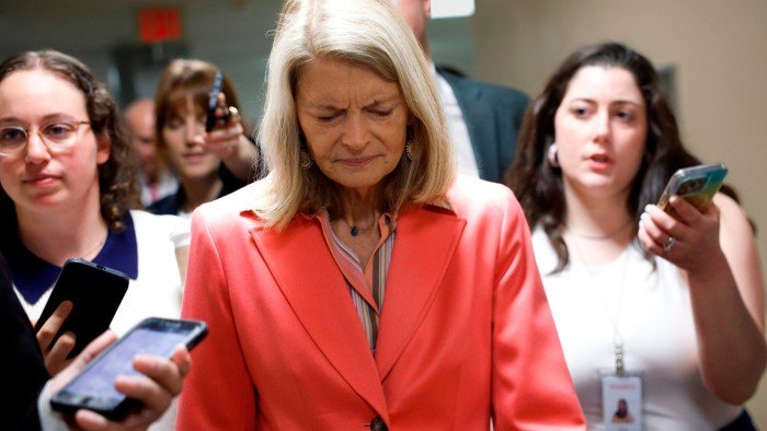 Senator Lisa Murkowski talks to reporters at the US Capitol on March 25