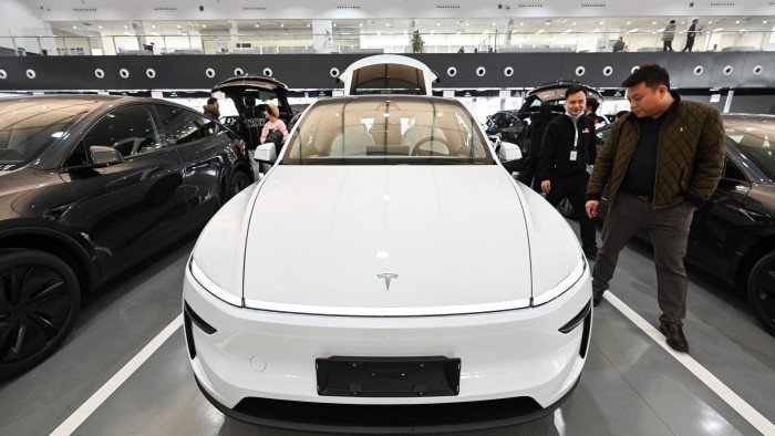 A white Tesla car